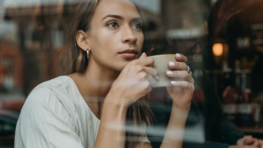 why do men give mixed signals confused woman looking at phone, 